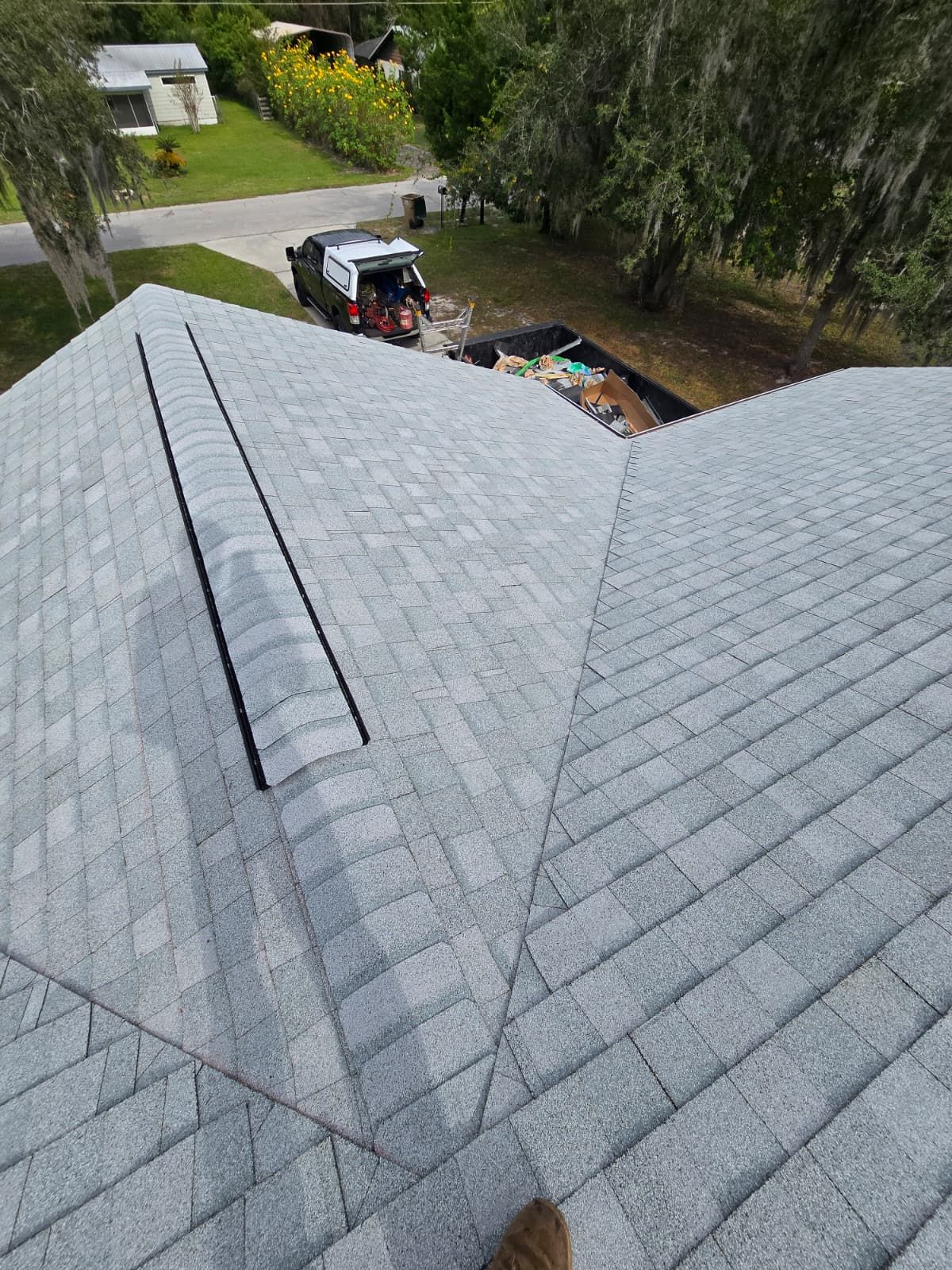 Shingle roof installation near Lakeland FL showing newly installed shingles on residential roofing project.
