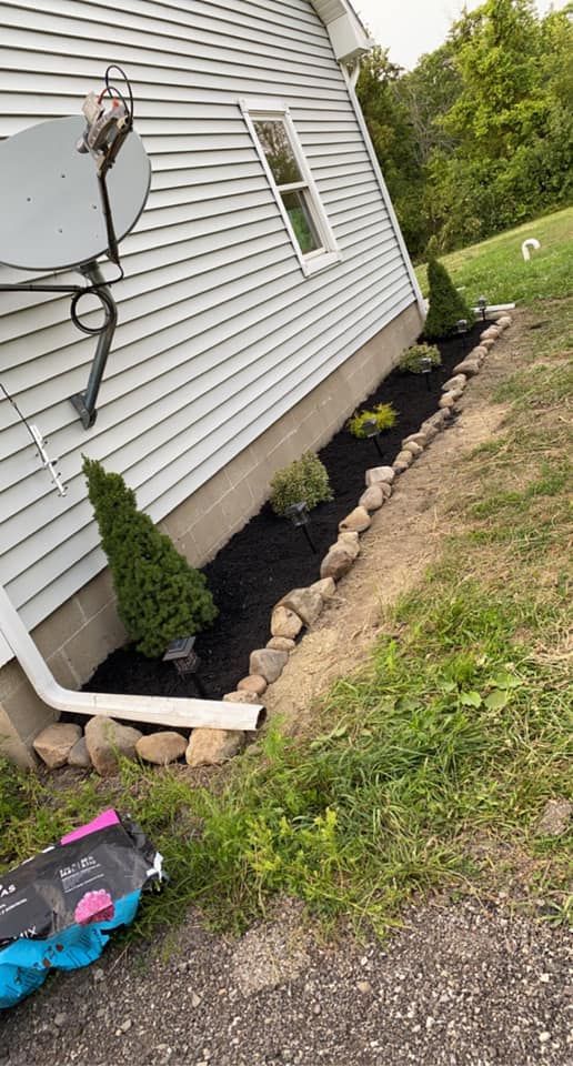 A house with a satellite dish on the side of it.