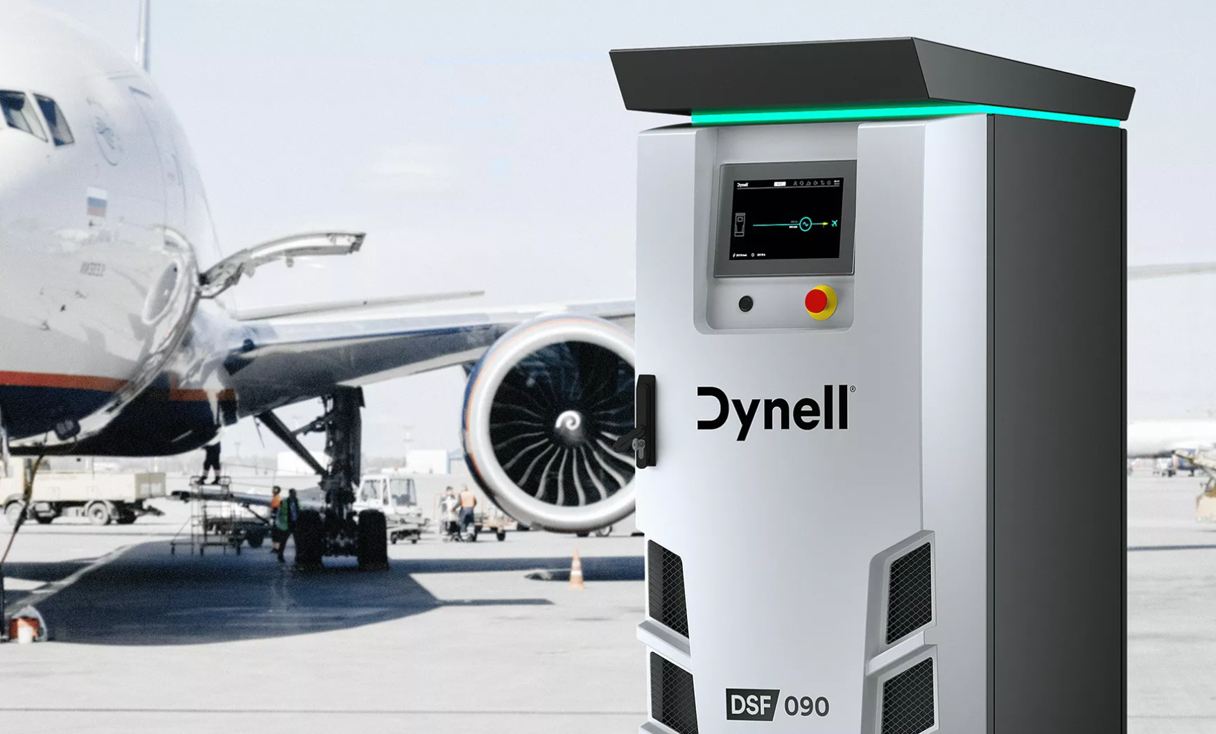 Ein Flugzeug steht vor einer Ladestation von Dynell.