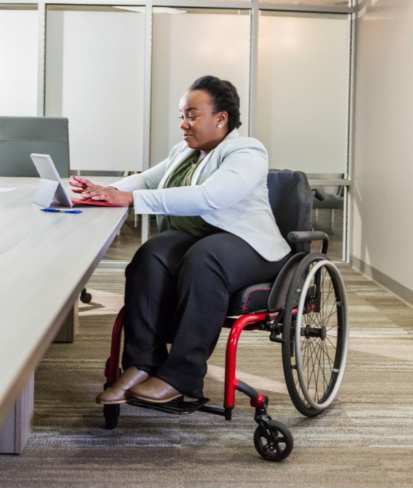 Closeup shot of an unrecognizable man sitting in a wheelchair