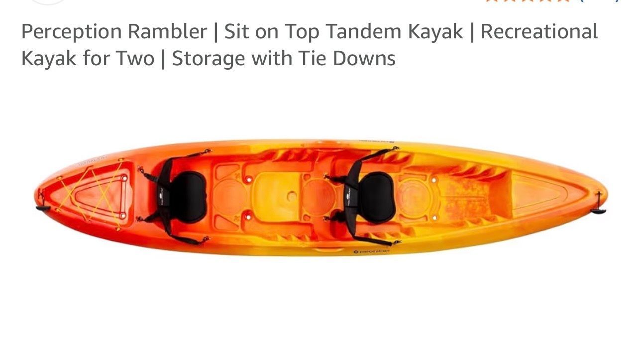 A sunset over a mountain range with a lot of fog