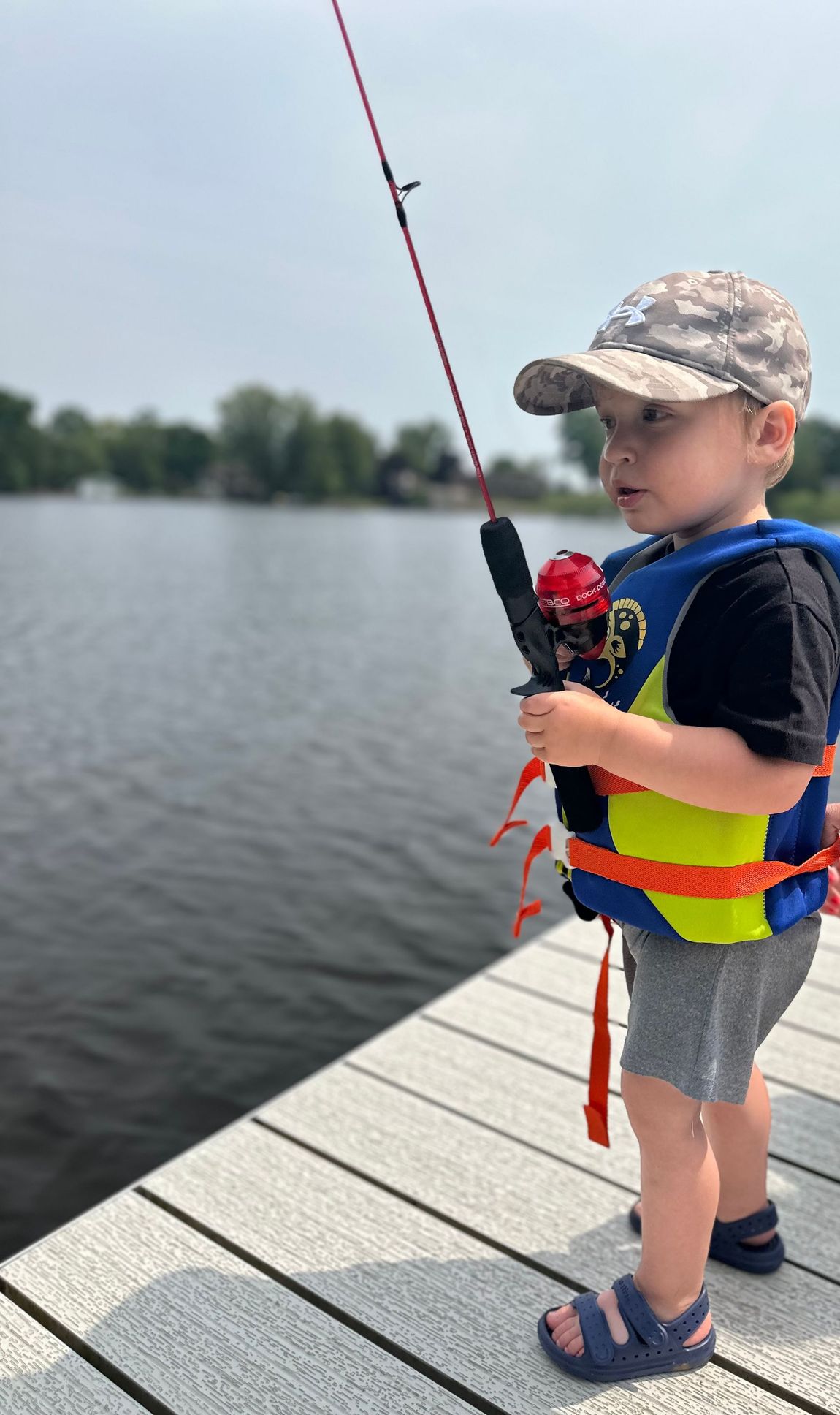 A sunset over a mountain range with a lot of fog