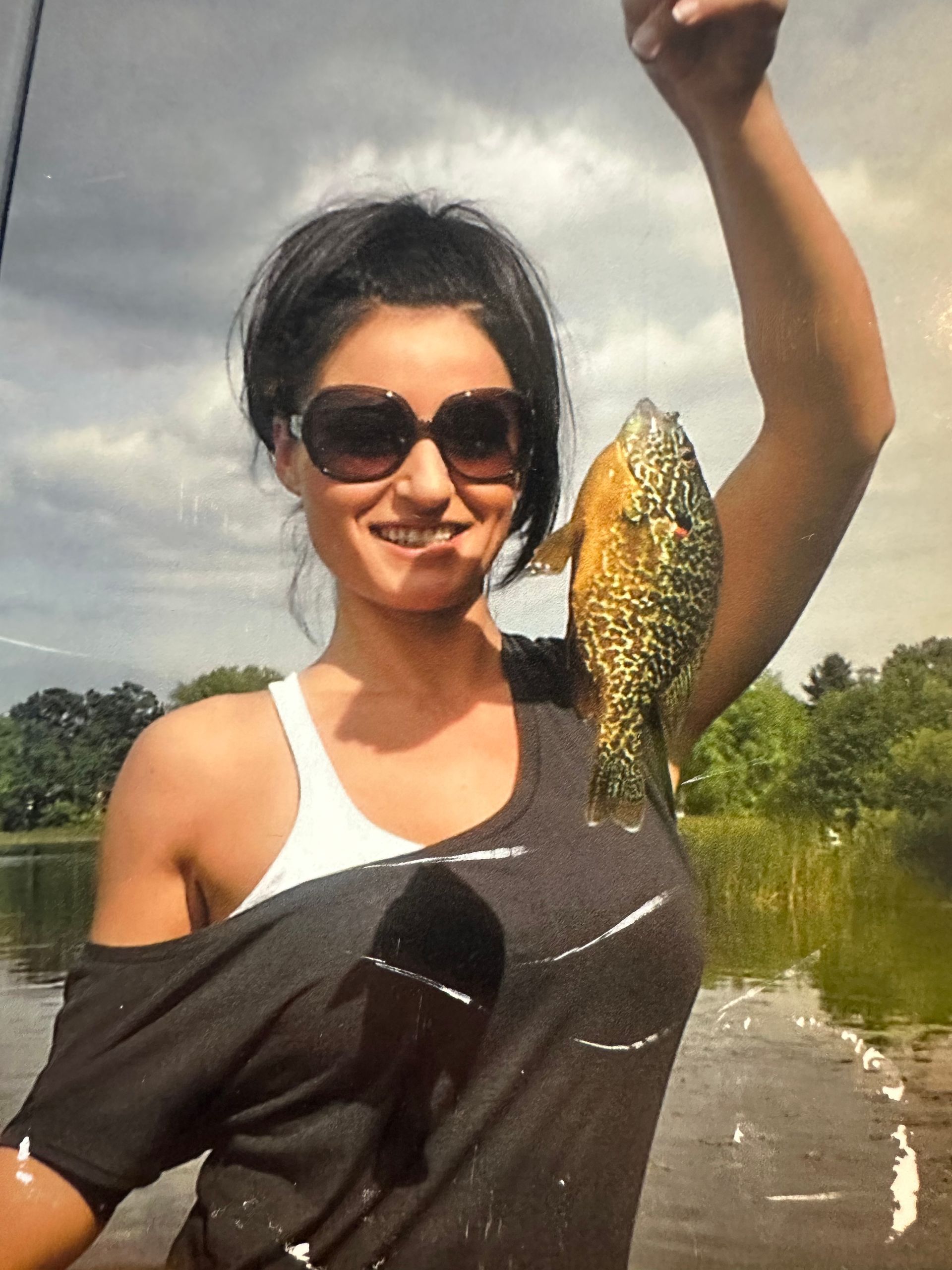 A sunset over a mountain range with a lot of fog