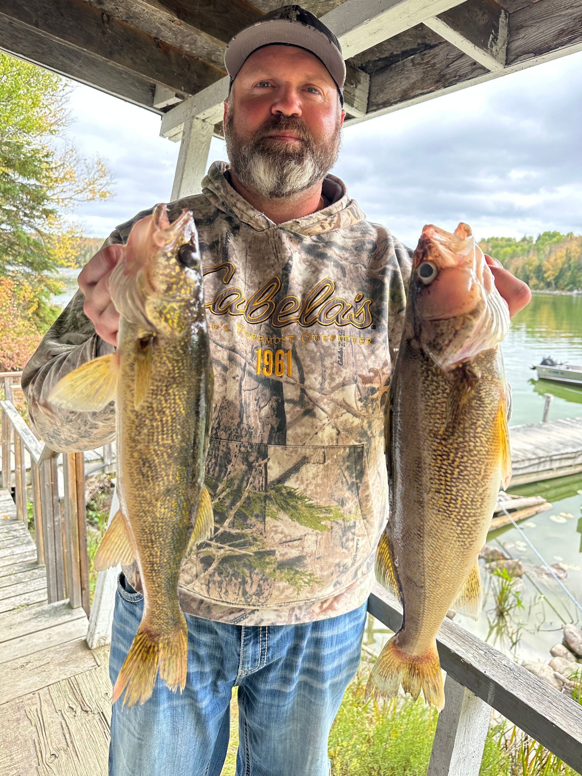 A sunset over a mountain range with a lot of fog