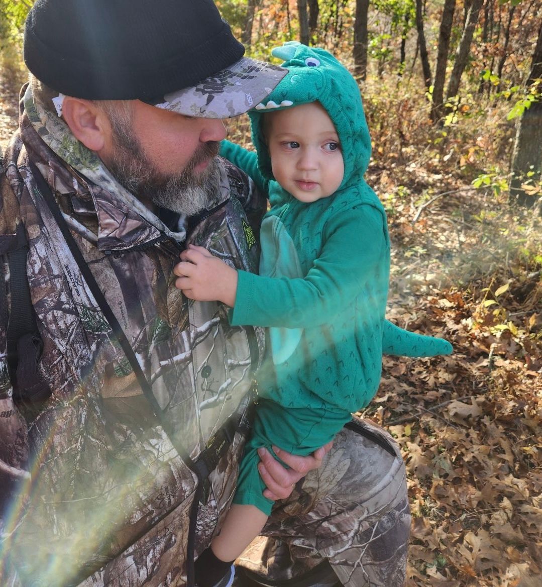 A sunset over a mountain range with a lot of fog