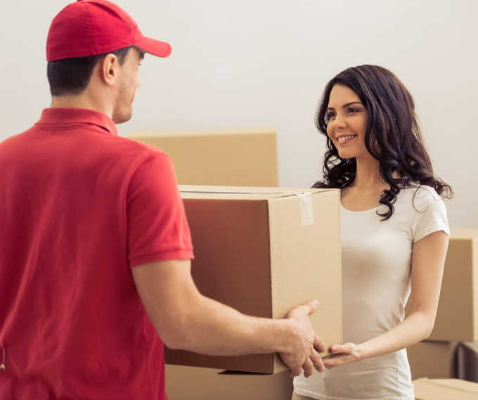 a mover helping a girl moving into her new apartment