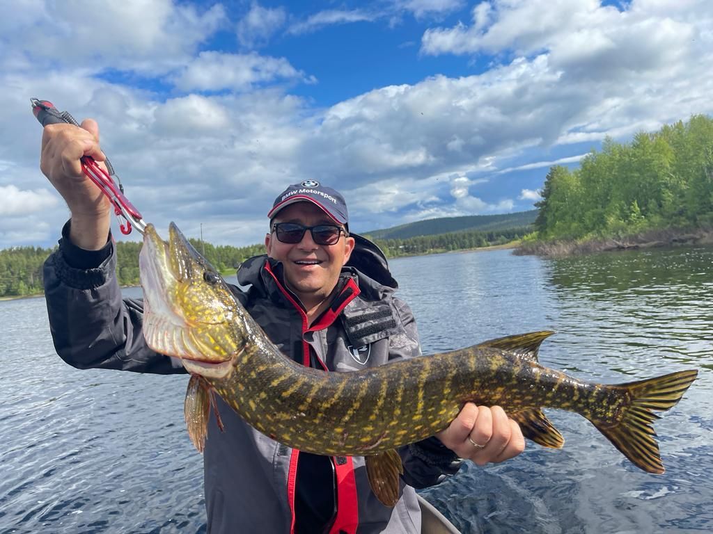 adventure in Finnish Lapland with local guide and campfire