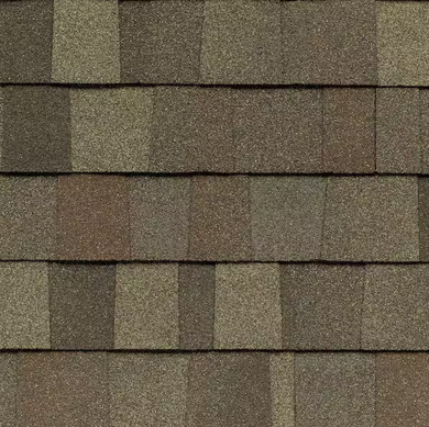 Brown and tan asphalt roof shingles arranged in a staggered pattern.