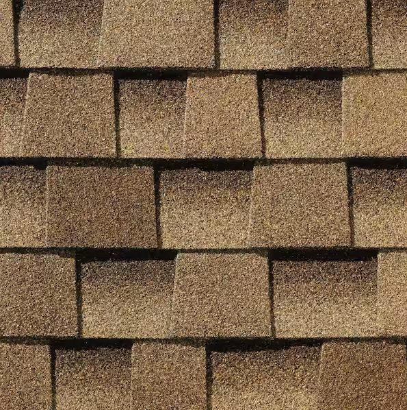 Brown asphalt roof shingles, overlapping in a brick-like pattern.