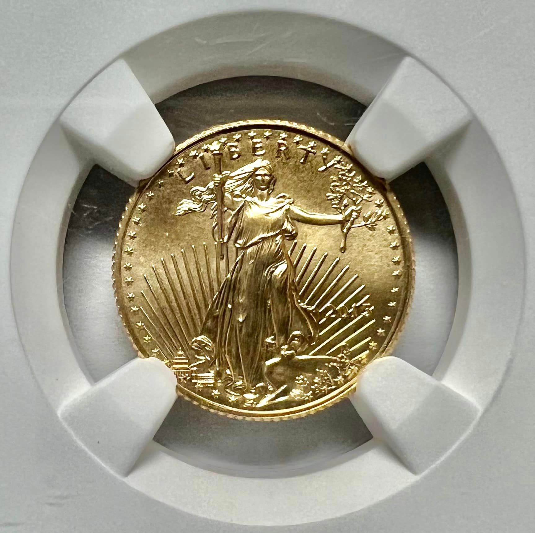 A gold coin with the word liberty on it