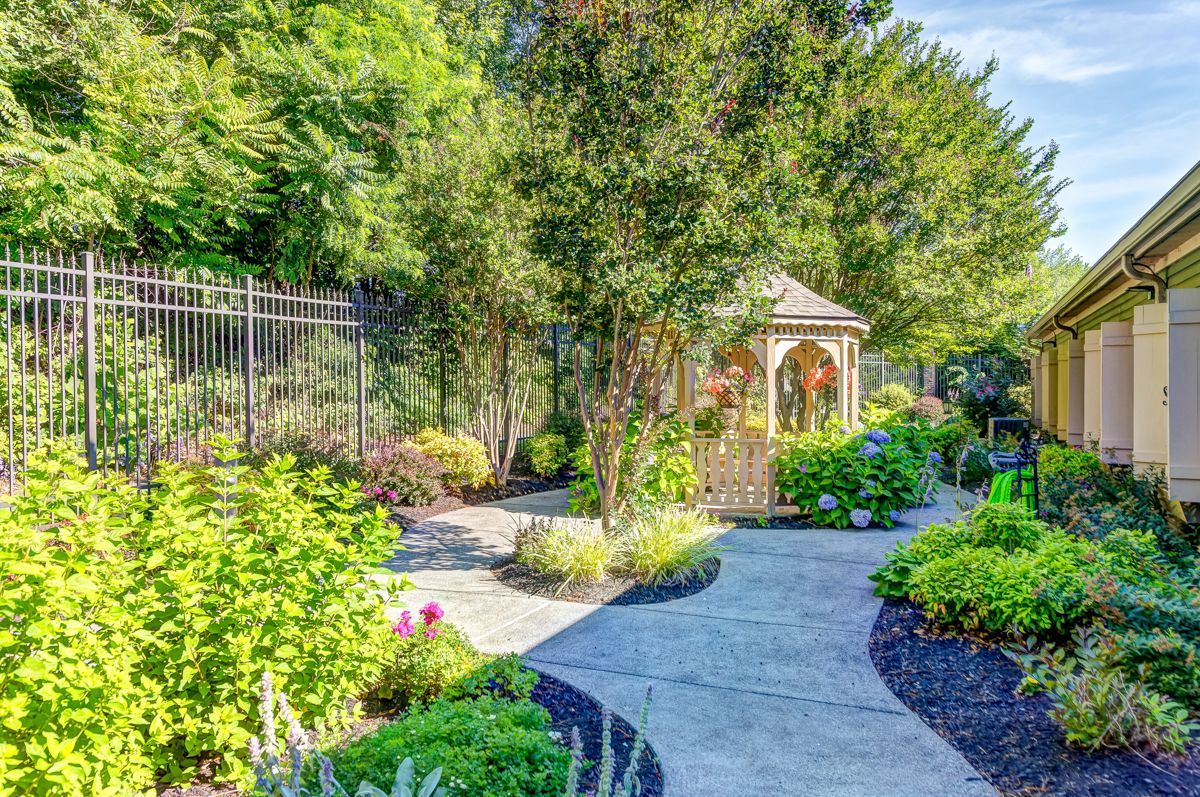 There is a gazebo in the middle of the garden.