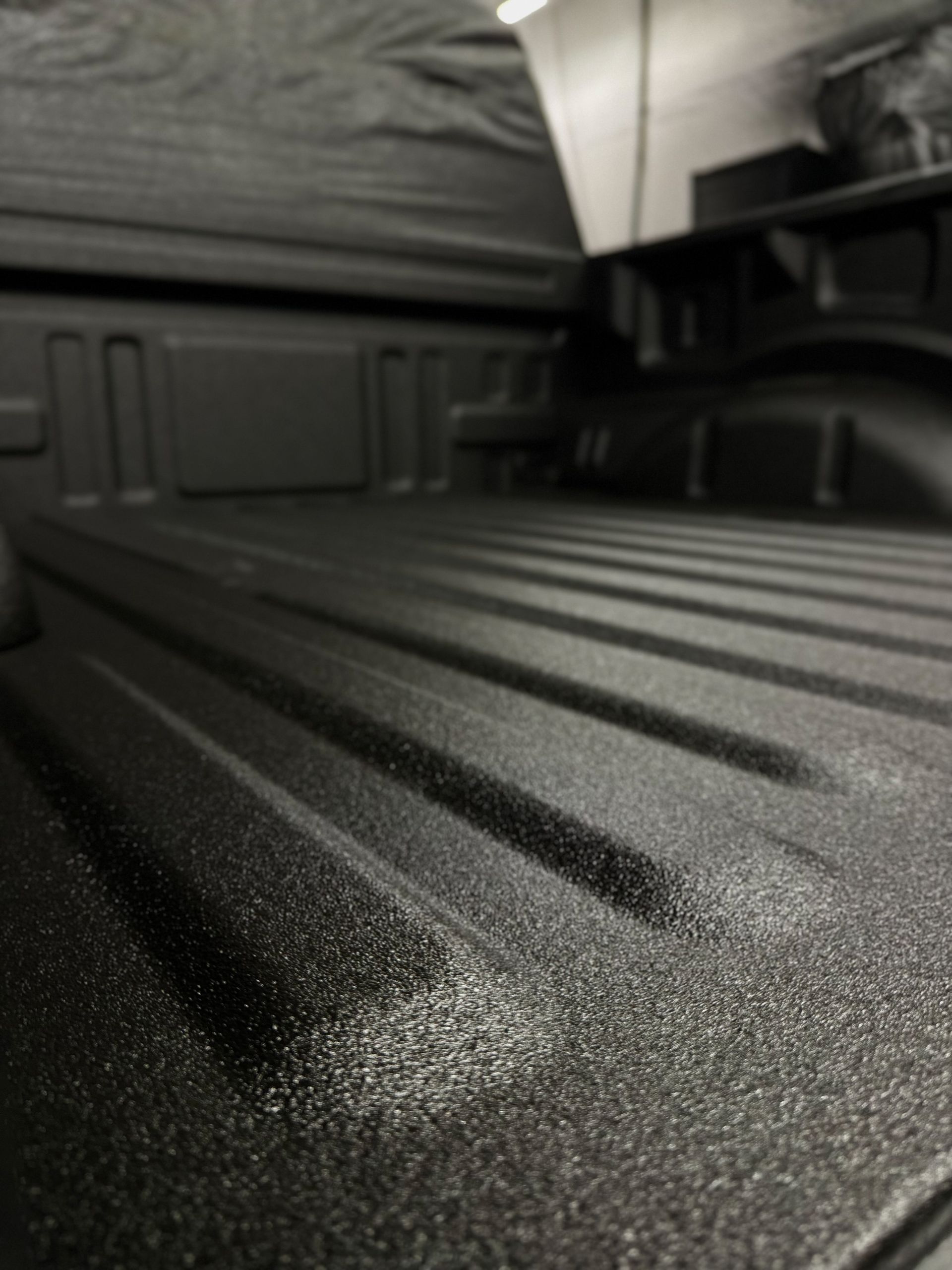 A porsche car is parked in a garage