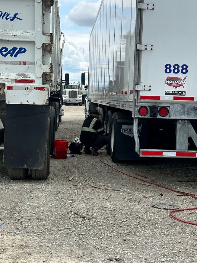 Employee working on truck