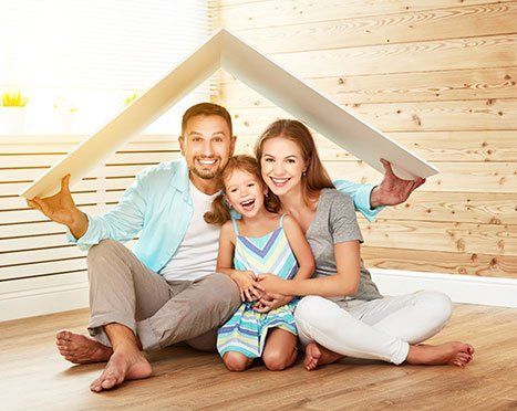 Homeowners— Family holding a Toy Roof  in Churchville, MD