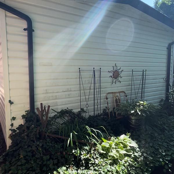 House Vinyl with Garden — Woodstock, ON — Exterior Kleen