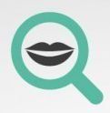 a magnifying glass with a smiling mouth inside of it .