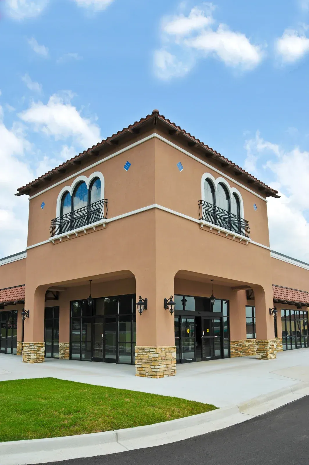 A large building with a blue sky in the background