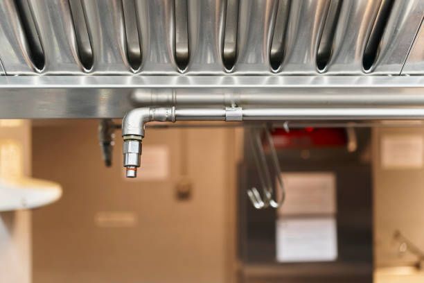 Fire protection system water outlet in an industrial kitchen of a restaurant.