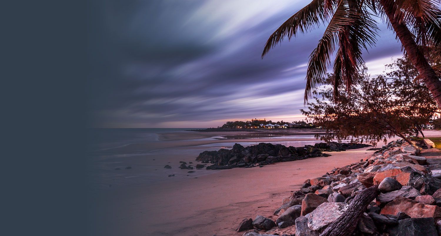 Beach at Dusk With Palm Trees — Integrate Health In Ooralea, QLD