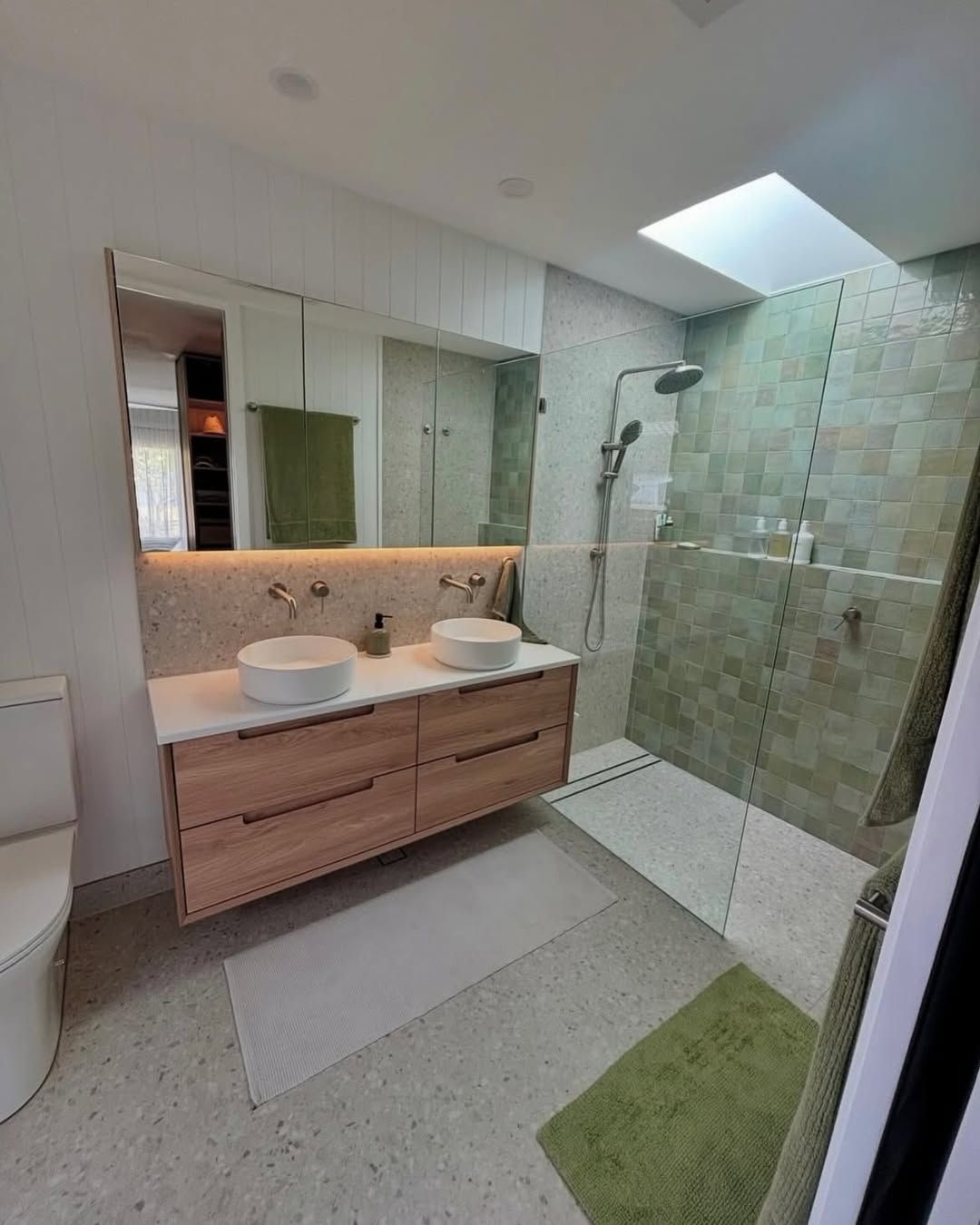 Modern Bathroom Wood Vanity With Two Sinks, Large Mirror, Glass Shower and Skylight — Seeto Tiling in Medowie, NSW