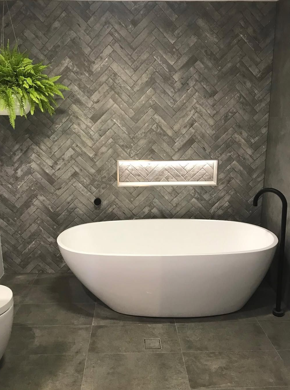 A bathroom with tile wall and bathtub — Seeto Tiling in Fingal Bay, NSW