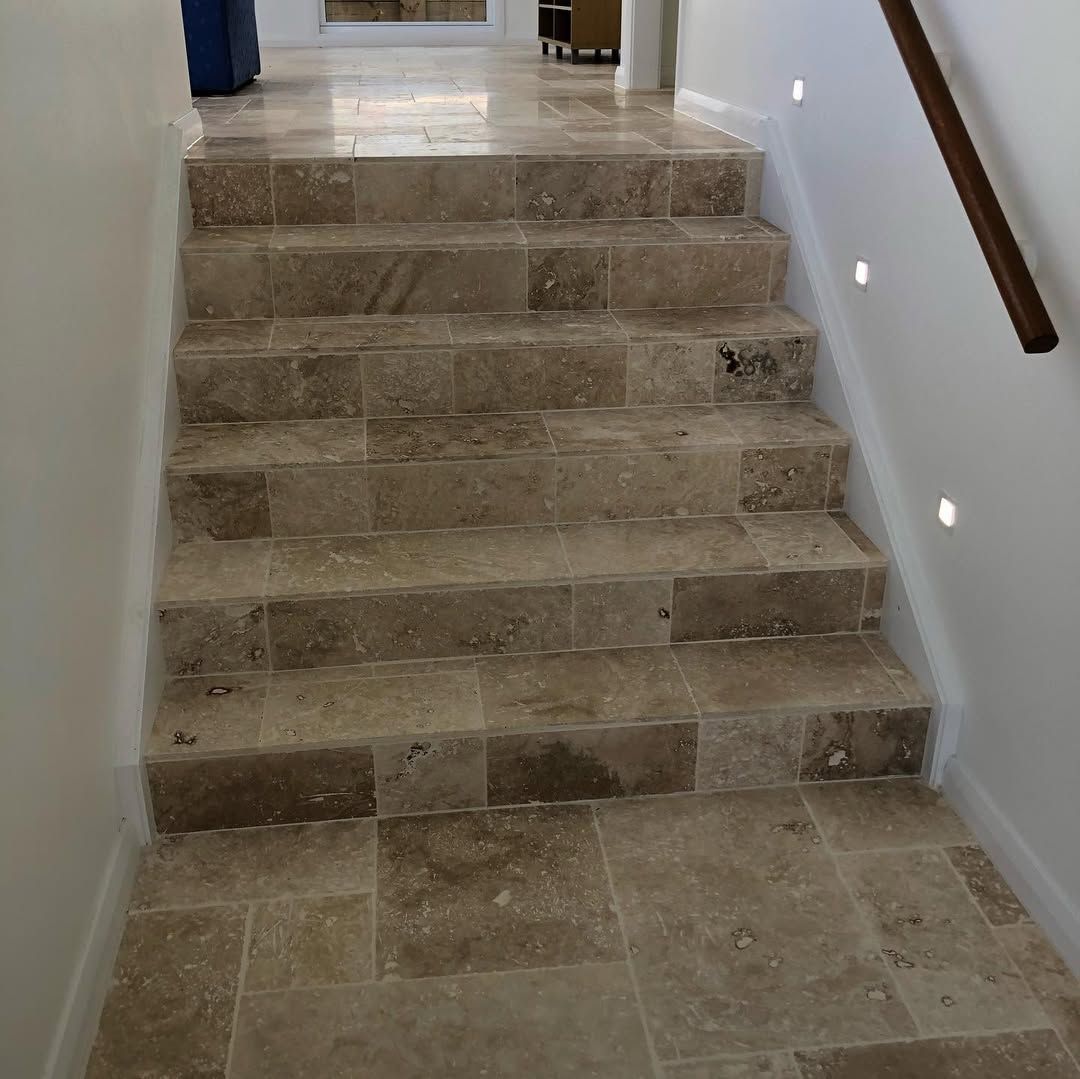 Stone Stairs With Recessed Lighting and a Wooden Handrail — Seeto Tiling in Raymond Terrace, NSW