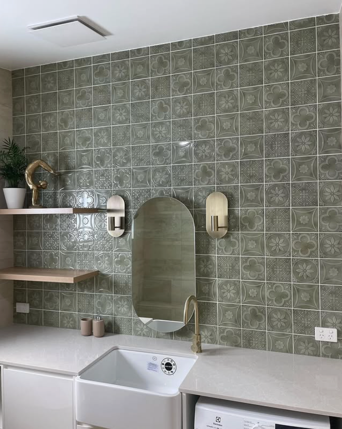 A Laundry with large green tiles on wall and mirror — Seeto Tiling in Fingal Bay, NSW