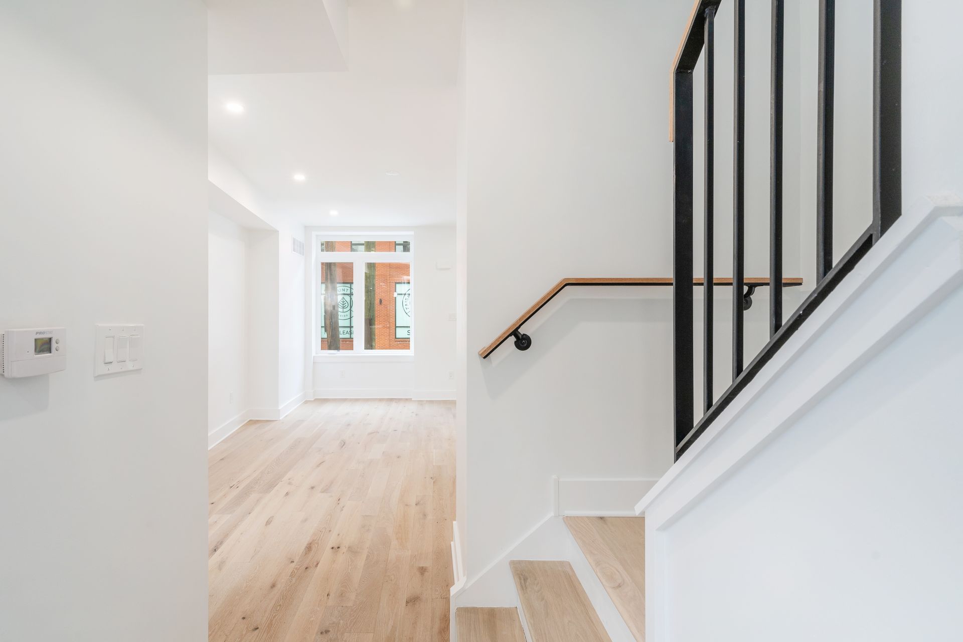 There is a staircase leading up to the second floor of a house.