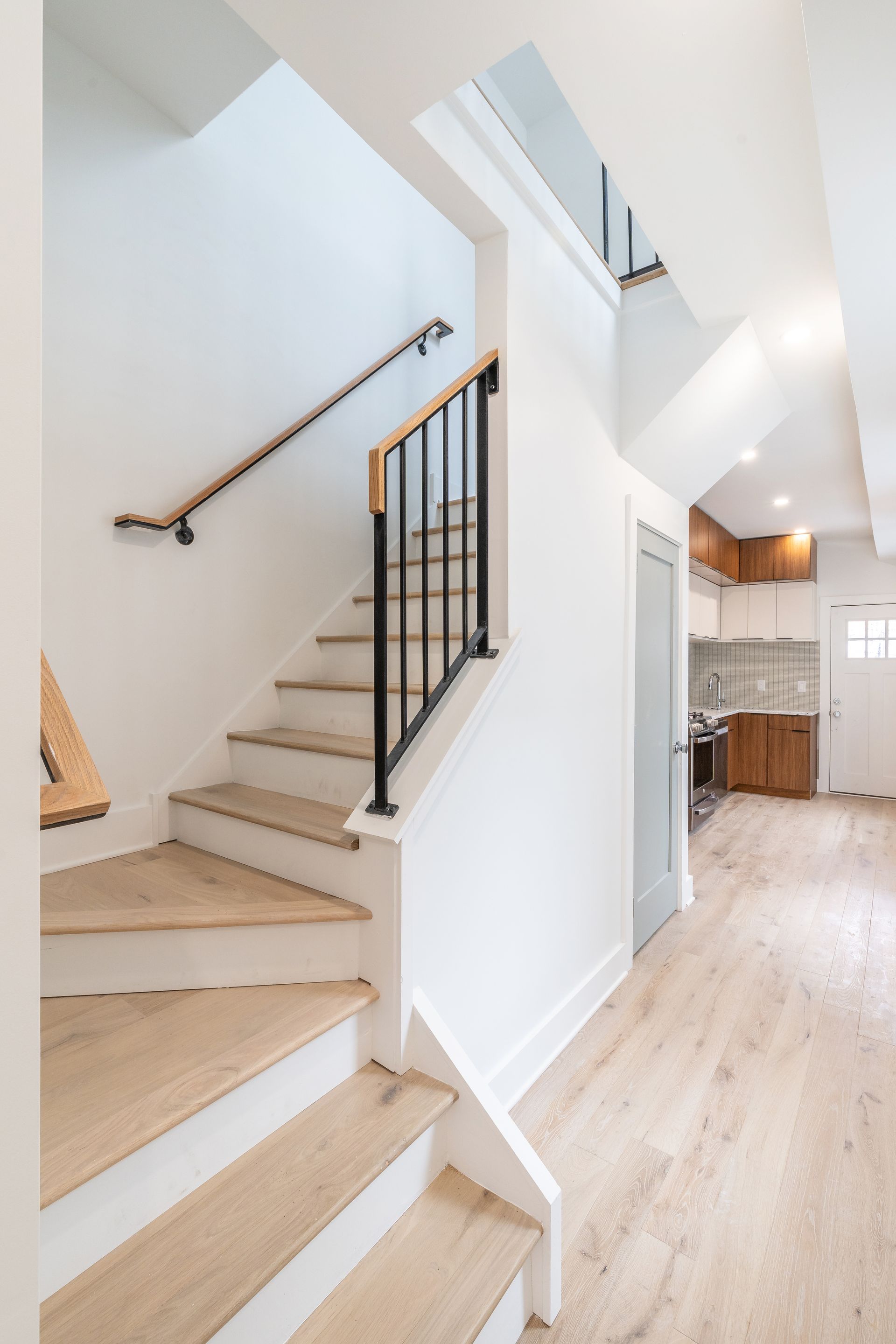 A staircase leading up to the second floor of a house