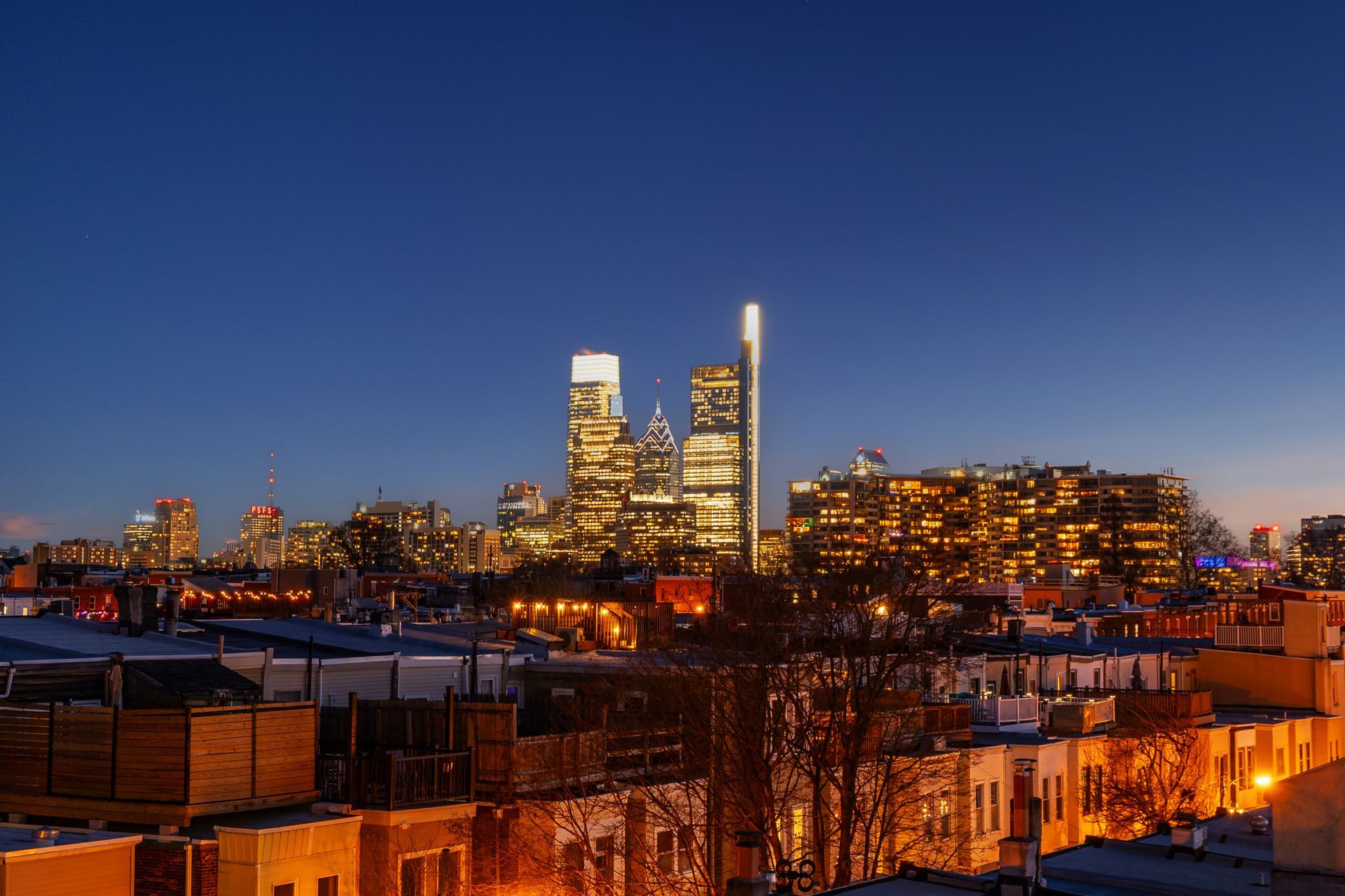 An aerial view of a city skyline at night
