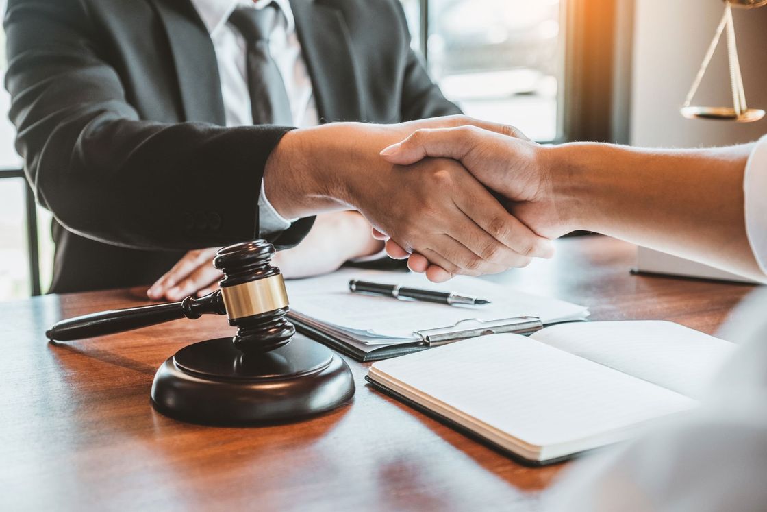 Lawyer Handshake with Client — Lake Jackson, TX — Mark R. Davis P.C.