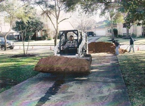Swimming Pool Destruction — Front Loader Truck Carrying Soils in Houston, TX