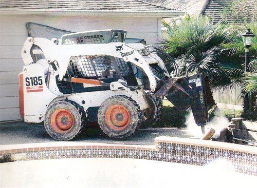Swimming Pool Destruction & Service — Construction Truck Destructing the Pool Side in Houston, TX