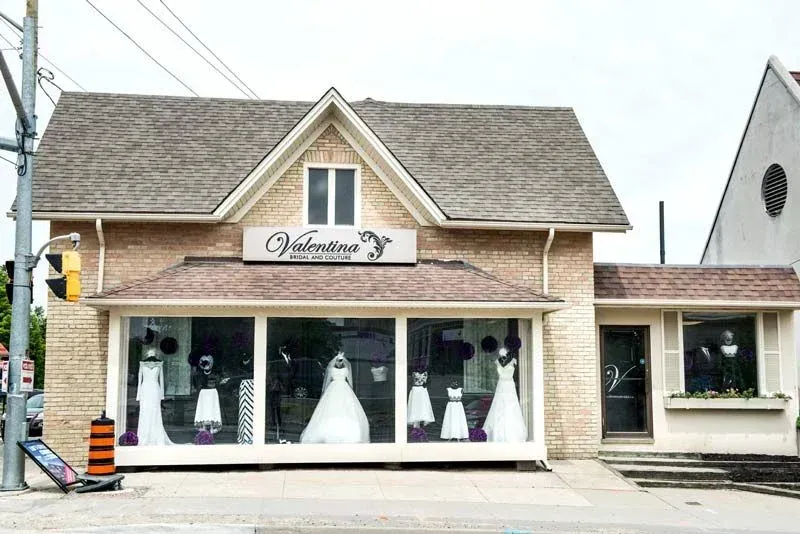 A building with a lot of windows and a sign that says valentine 's