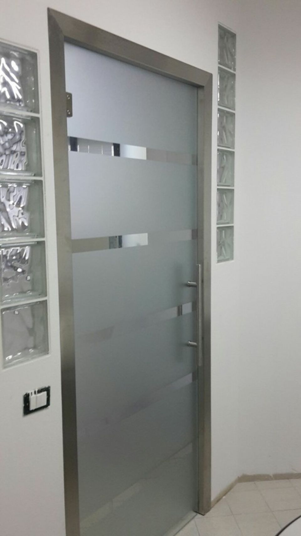 realizzazione porte in vetro