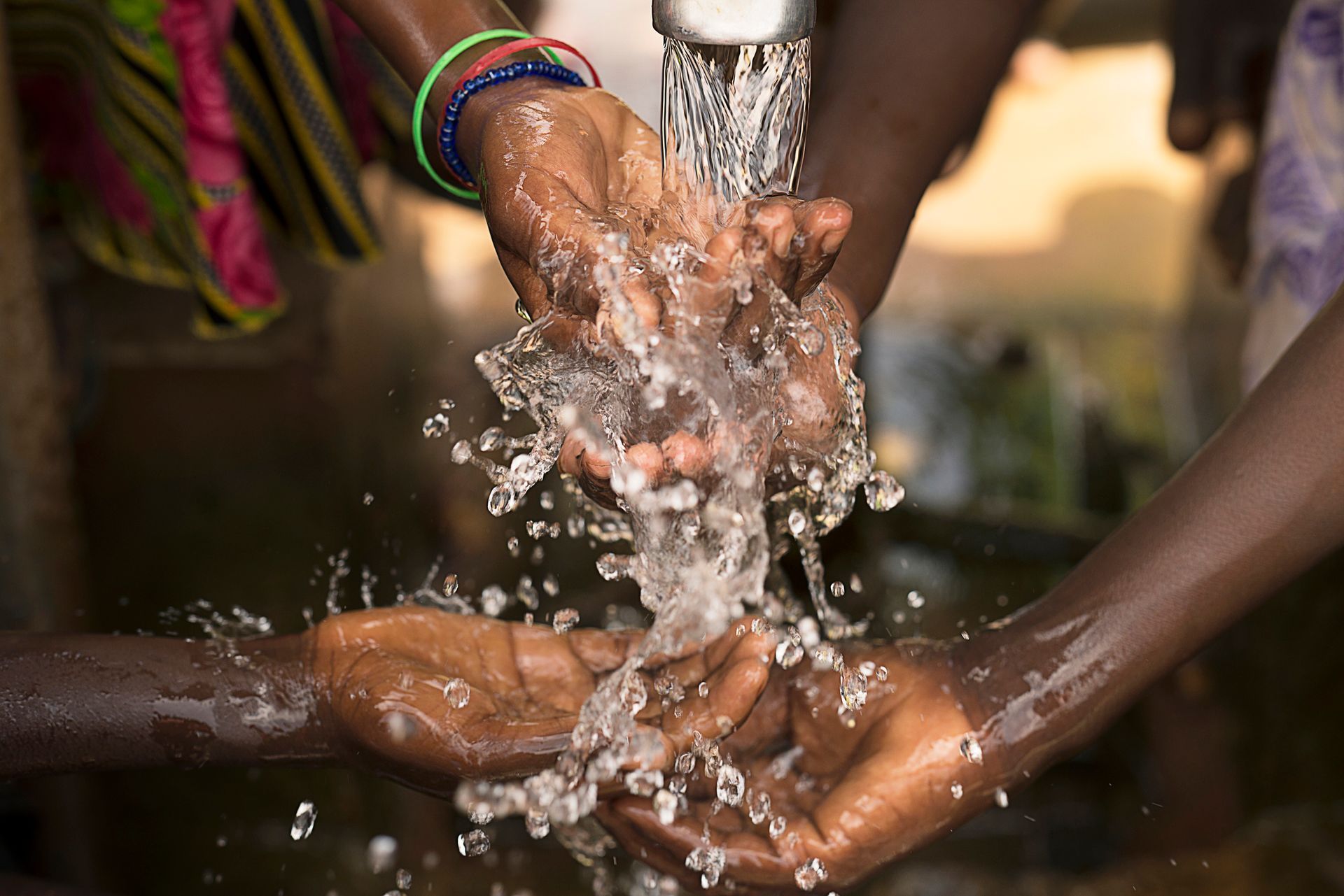 People Washing Their Hands With Water — Nazareth, PA — Keystone Pump & Well Service