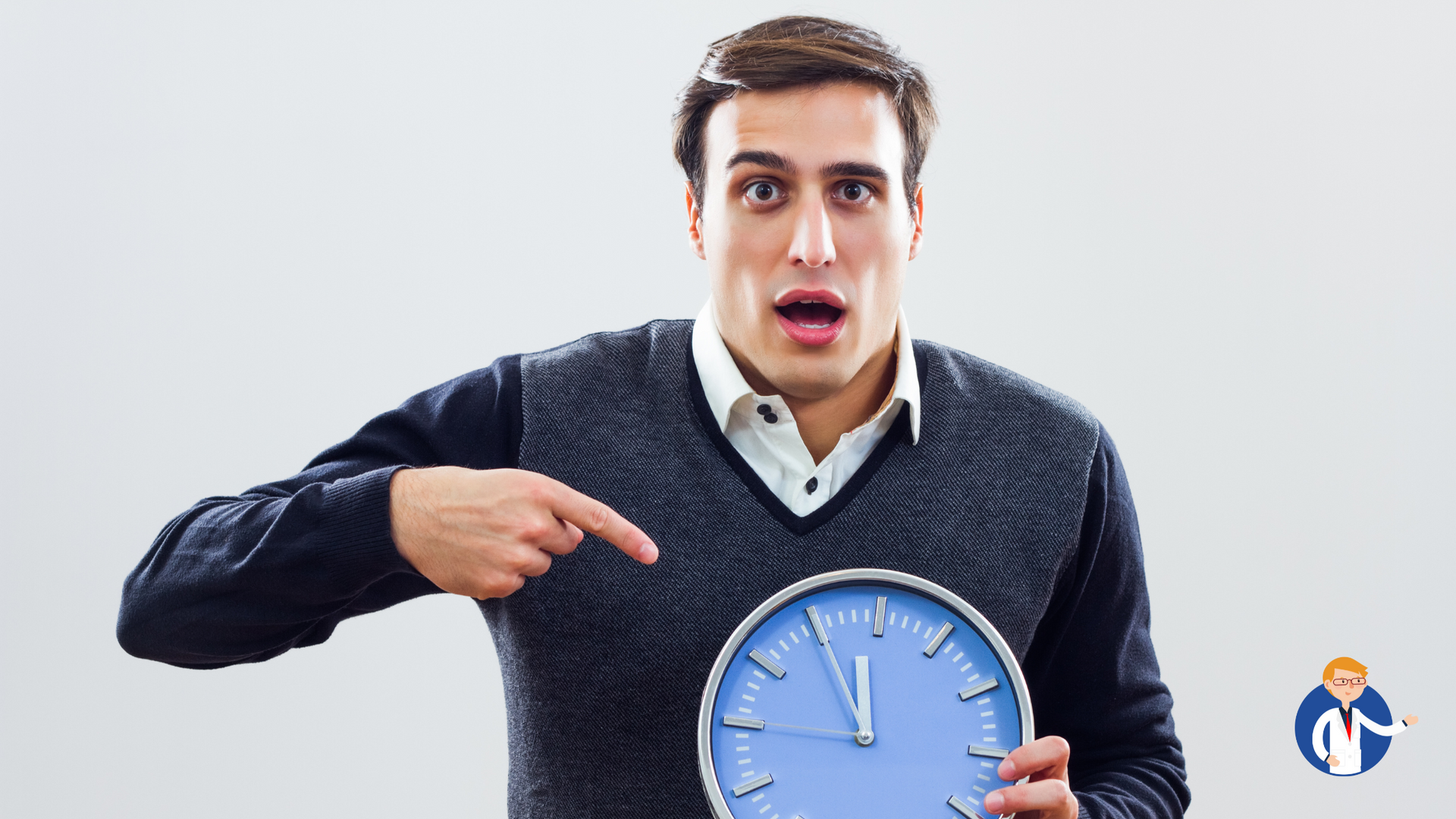 A man is holding a clock and pointing at it.