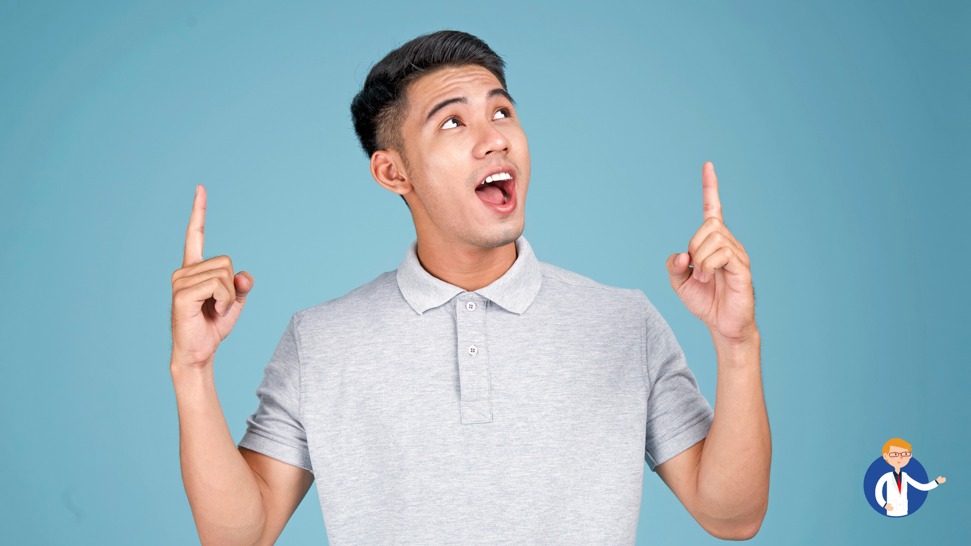 A young man is pointing up with his fingers.