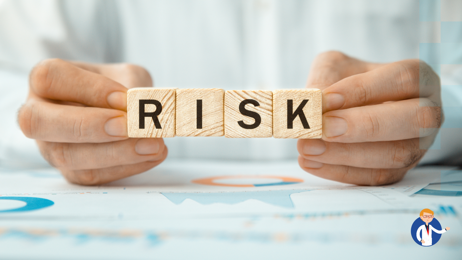 A person is holding wooden blocks that spell out the word risk.