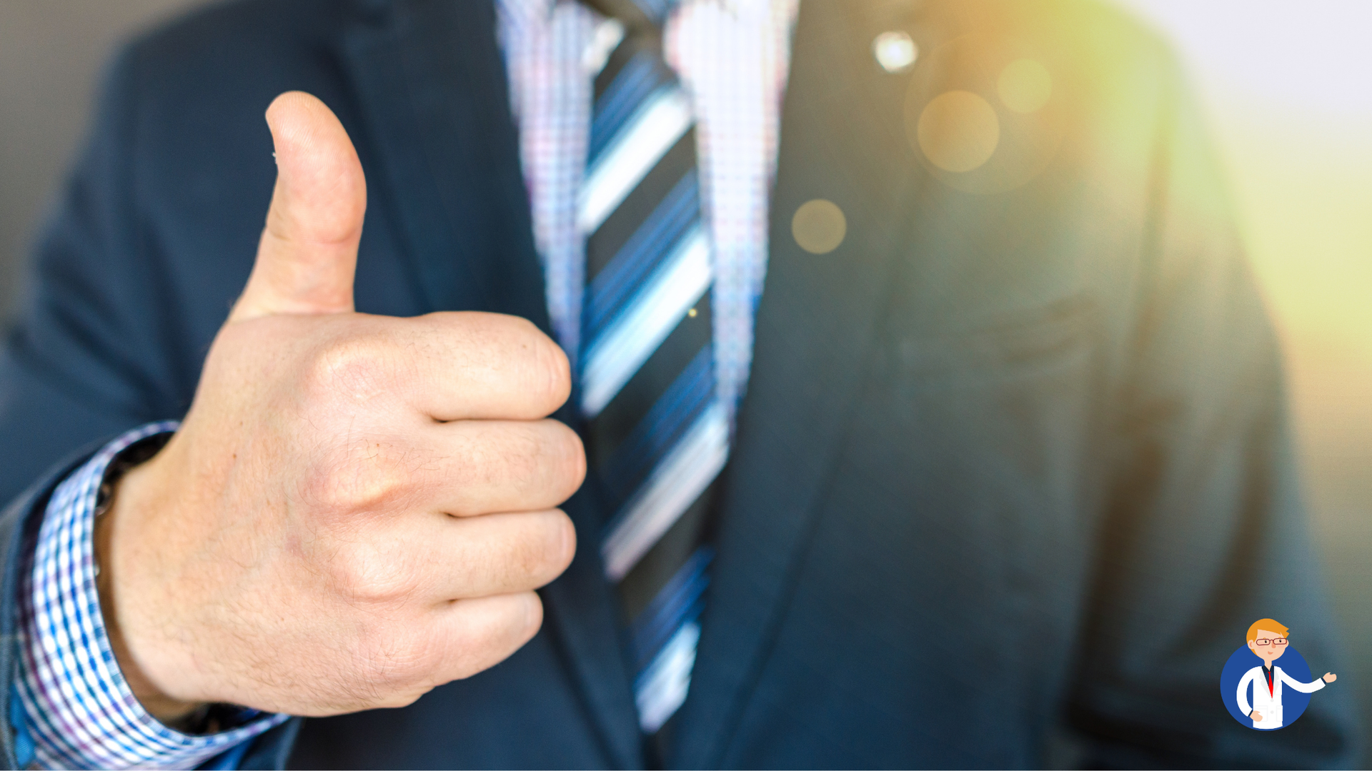 Man in suit gives thumbs up.