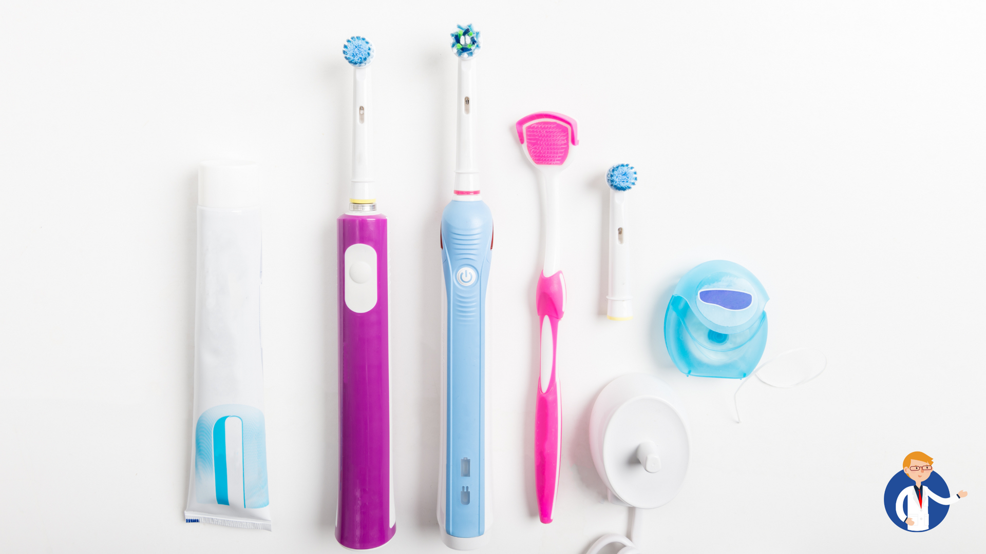 A group of electric toothbrushes and tongue cleaners on a white surface.