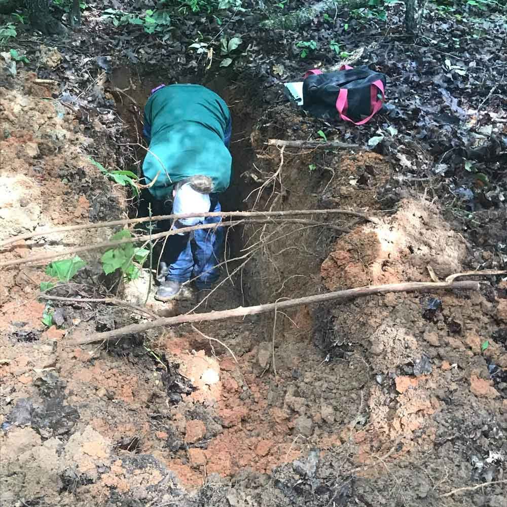 Worker Digging the Ground — Benton, AR — Emery Pump Service