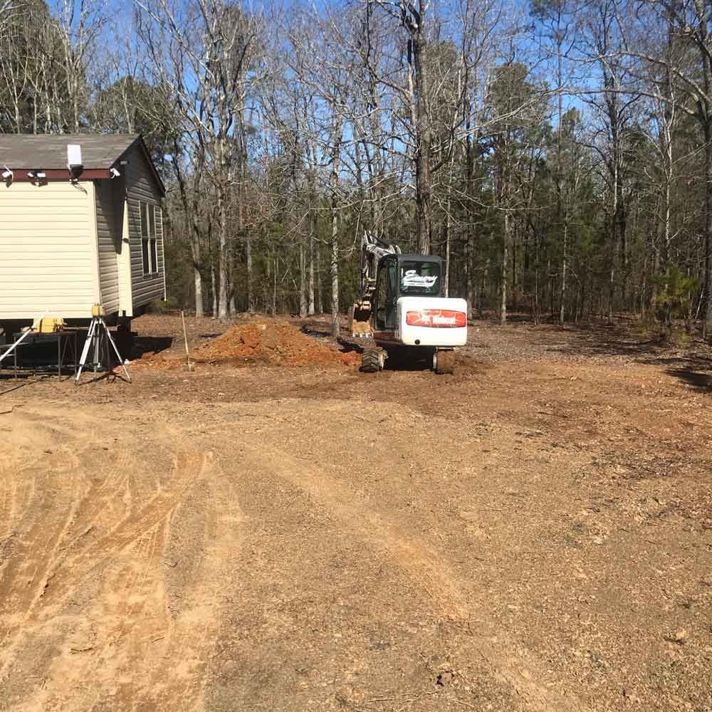 Excavator Working on A Field — Benton, AR — Emery Pump Service