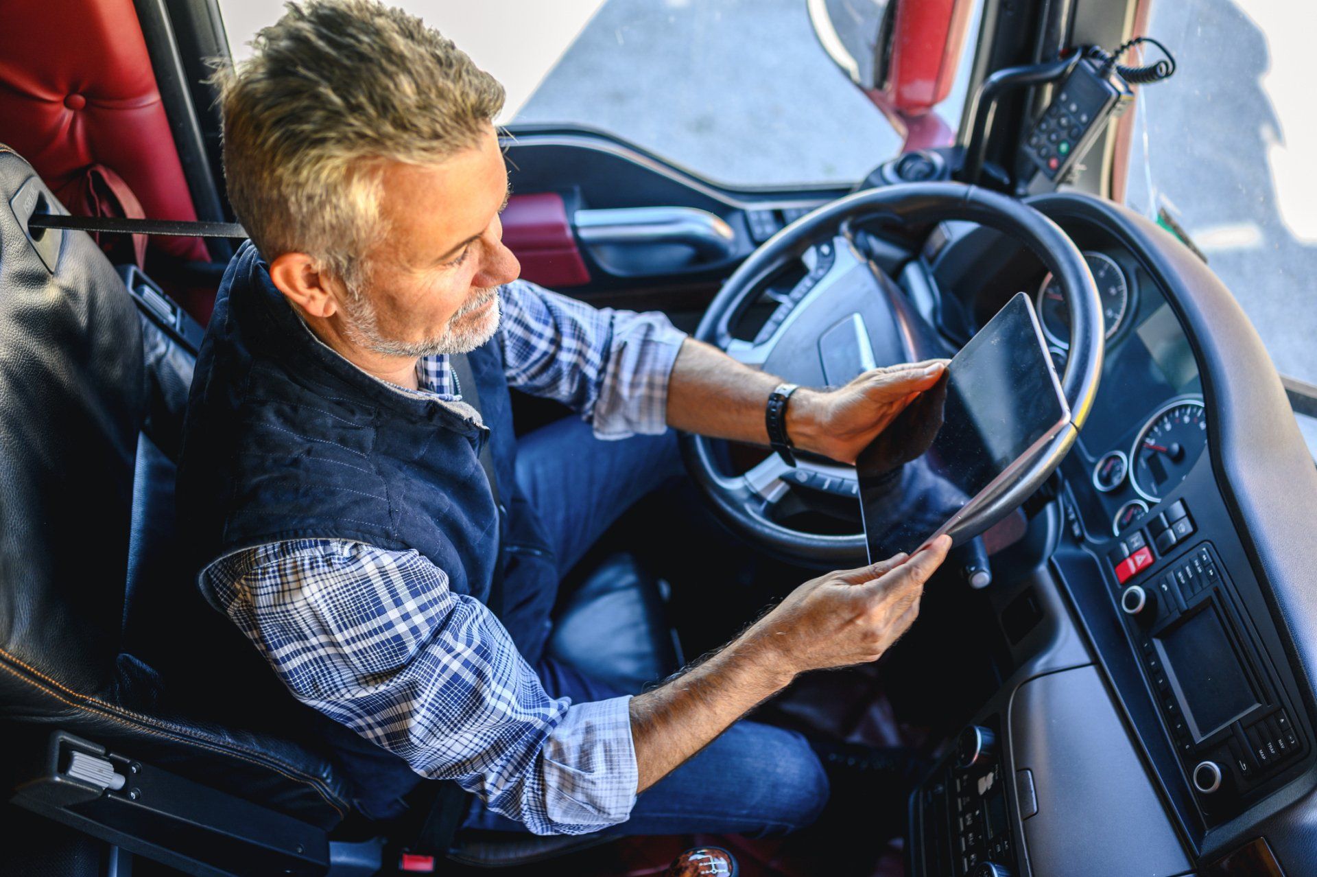 Truck Driver Using Tablet — Wilmington, DE — Gulf Coast Transport, Inc