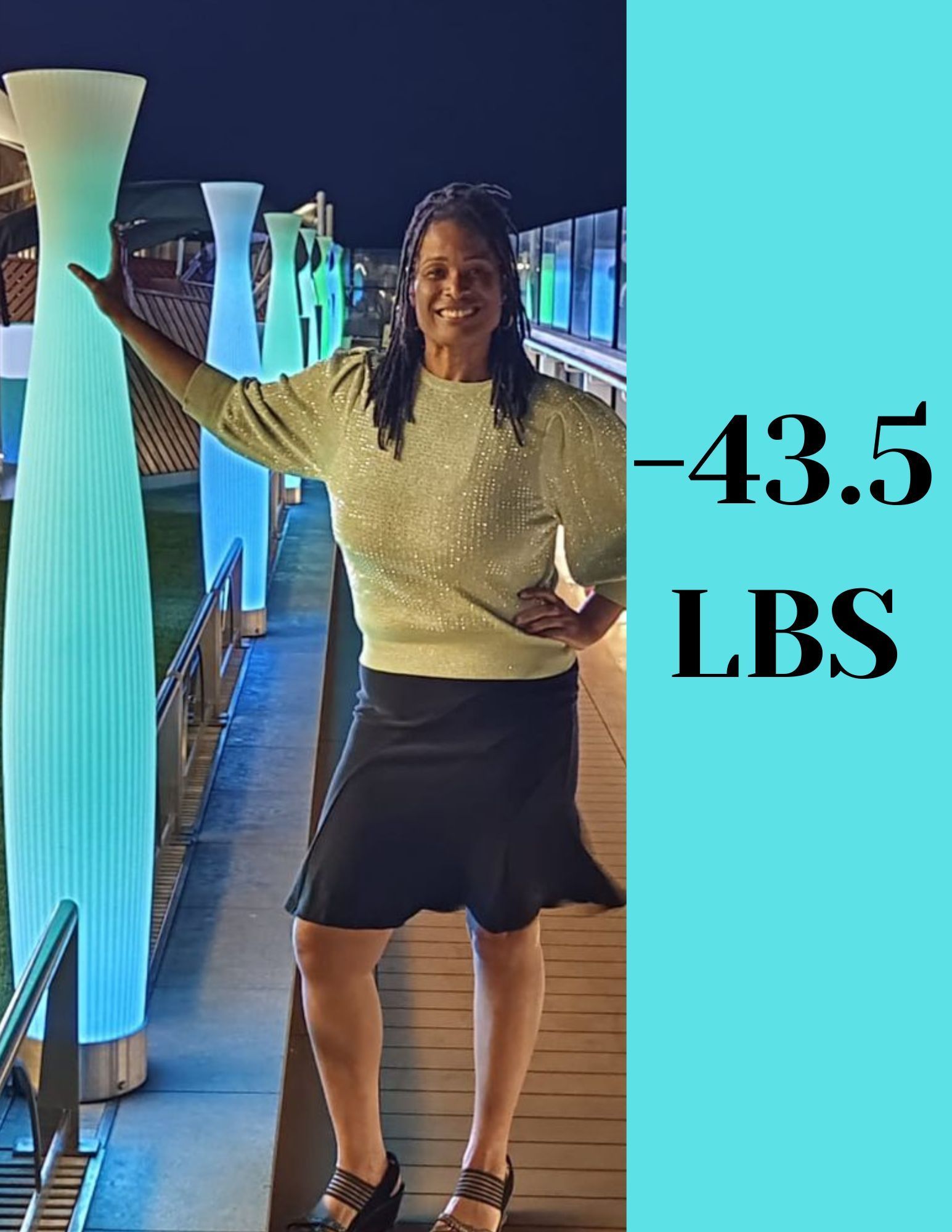 A woman is standing in front of a row of tall vases.