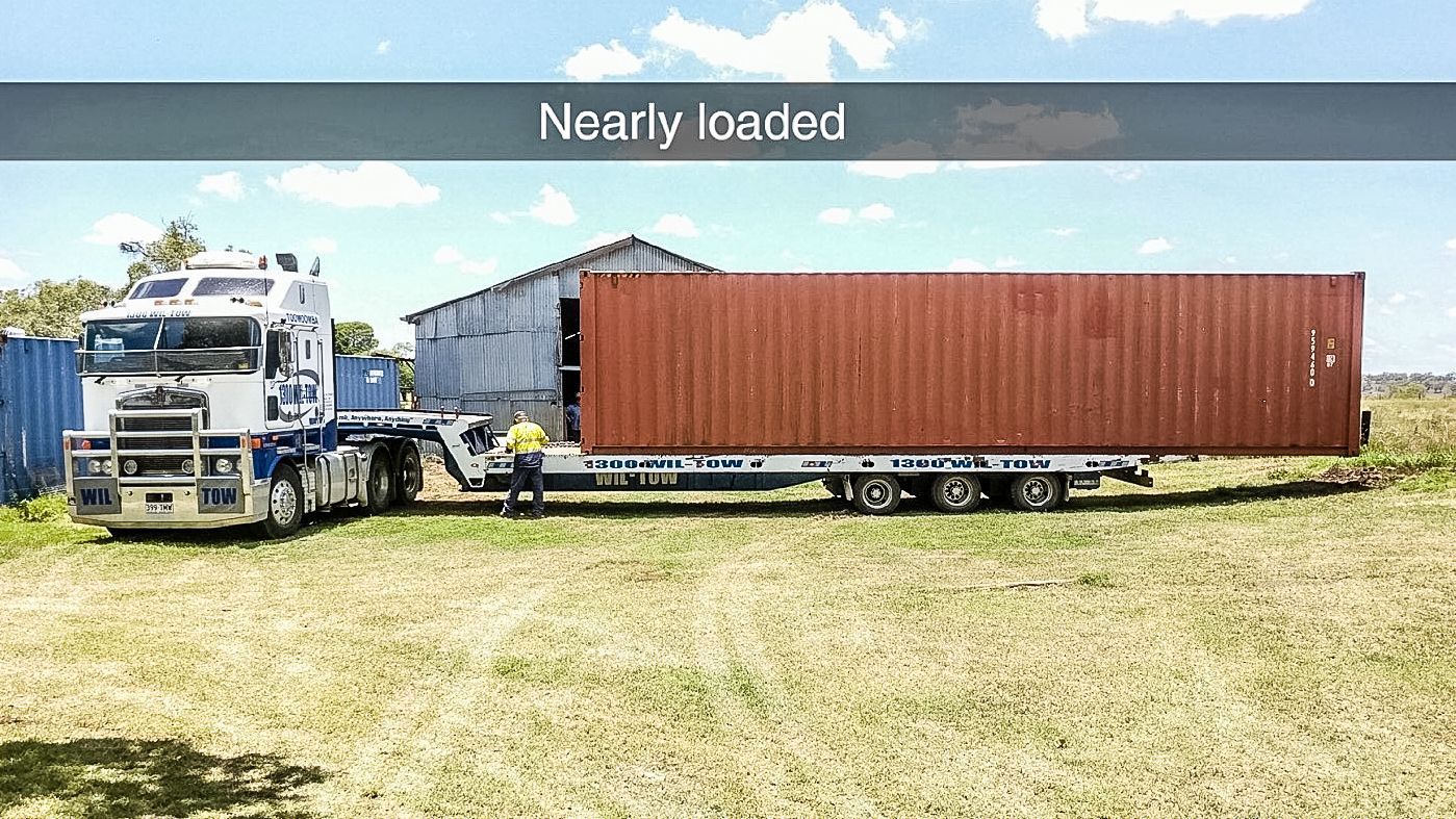 A Towing Truck Towing A Trailer — Wilson's Towing In North Toowoomba, QLD