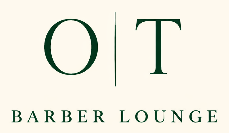 Logo for OT Barber Lounge with dark green lettering on a light beige background featuring a vertical line between O and T.