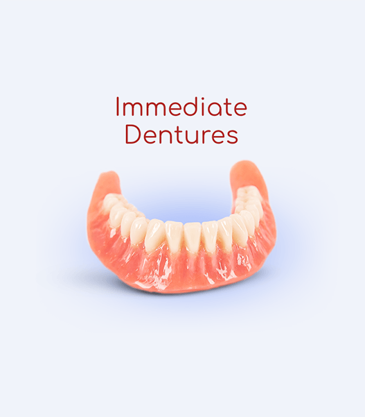 An immediate denture is shown on a blue surface.