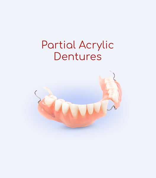 A picture of partial acrylic dentures on a blue background.