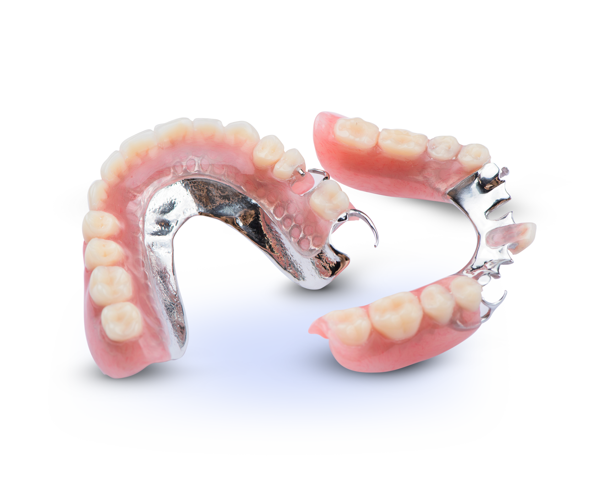 A close up of a pair of dentures on a white background